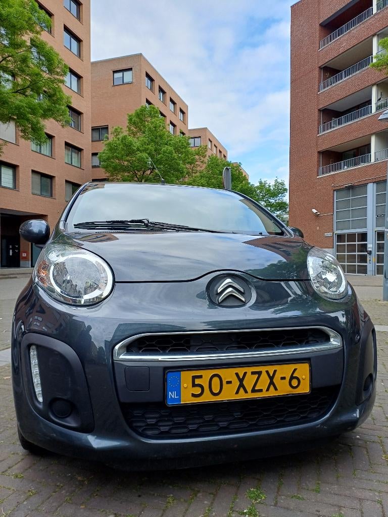 Citroën C1 1.0 5-deurs uit 2012, kleur: grijs, Auto's, Stof, 4 stoelen, C1, 68 pk