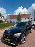 BMW X1 Sdrive 18I 2012 Zwart, Auto's, BMW, X1, Zwart, 4 cilinders, Zwart