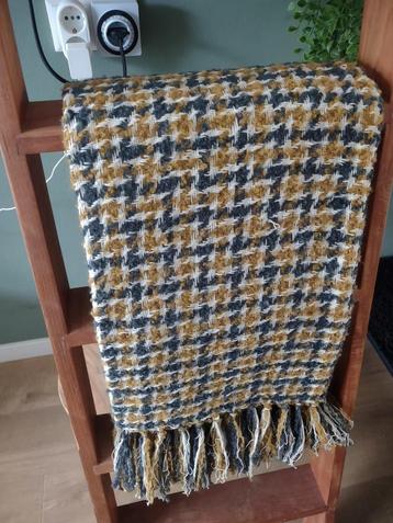 Plaid  beschikbaar voor biedingen