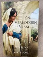 De Verborgen Vlam - Janette Oke en Davis Bunn, Boeken, Ophalen of Verzenden, Gelezen