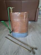 Vintage koperen rugspuit, Ophalen