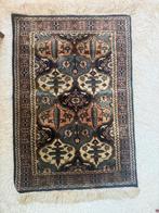 Perzisch kleedje handgeknoopt, Ophalen