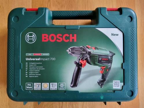 Bosch universal impact 700 klopboormachine. Nieuw, Doe-het-zelf en Verbouw, Gereedschap | Boormachines, Nieuw, Boormachine, 600 watt of meer