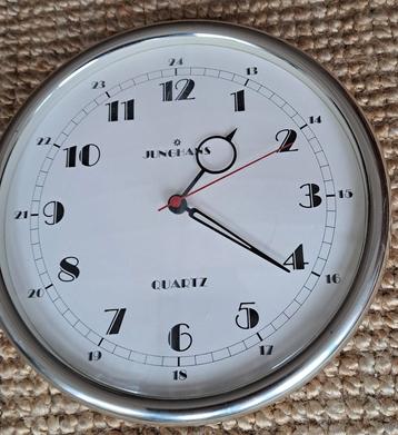 Vintage Junghans wandklok beschikbaar voor biedingen