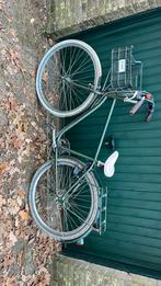 het is een groene fiets van btwin elops, 26 inch of meer, Gebruikt, Ophalen of Verzenden, BTWIN