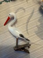 Oude glazen ooievaar, Ophalen