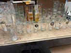 Ruim150 grolsch pullen voetglazen dubbeldruk glazen glas, Ophalen, Zo goed als nieuw, Bierglas