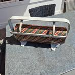 Houder met kadopapier te koop, Ophalen