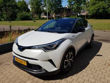 Toyota C-HR 1.8 Hybrid weinig km parelmoer wit bj 2017 beschikbaar voor biedingen