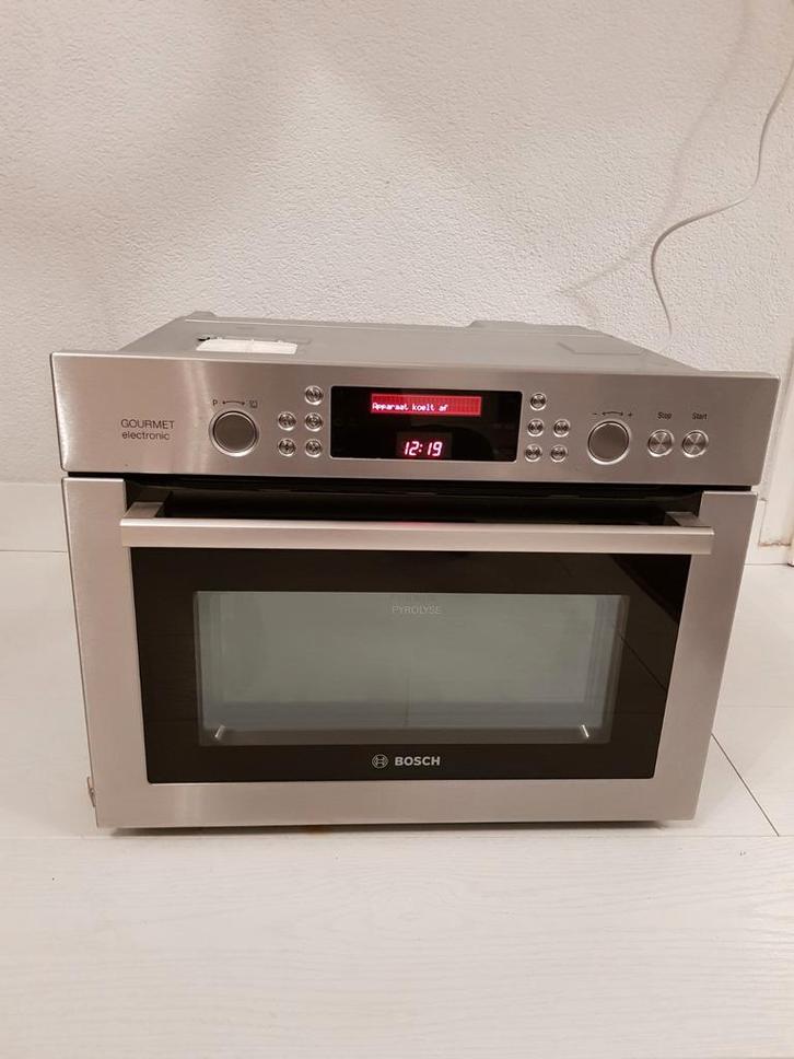 ZEER NETTE BOSCH RVS COMBI OVEN EN MAGNTROON FUNCTI, Witgoed en Apparatuur, Ovens, Zo goed als nieuw, 45 tot 60 cm, Hete lucht