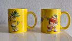 Twee Bekers M&M, Huis en Inrichting, Keuken | Servies, Ophalen of Verzenden, Zo goed als nieuw, Overige stijlen, Kop(pen) en/of Schotel(s)