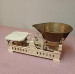 Oude kruideniersweegschaal, Ophalen