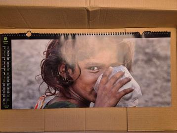 Oxfam novib jaarkalender met wissellijst beschikbaar voor biedingen