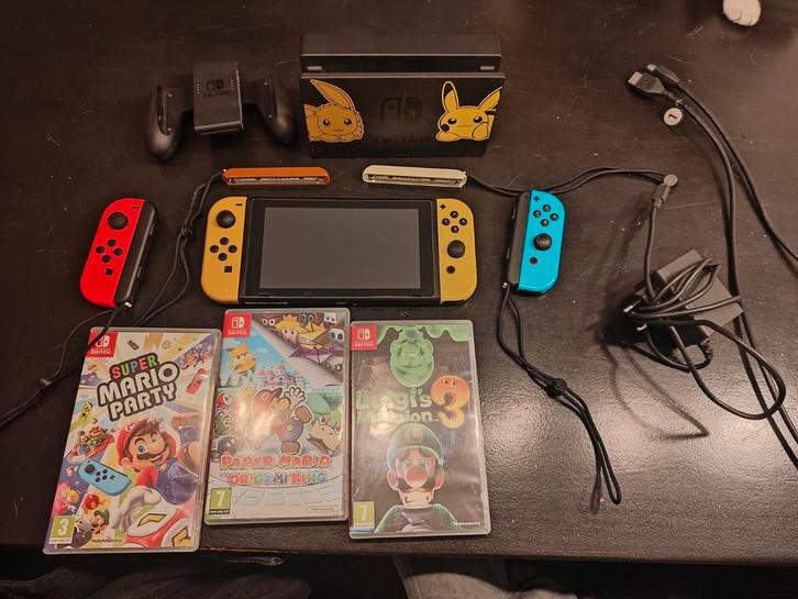 Nintendo Switch Let's Go Editie + 4 Games + Extra's!, Spelcomputers en Games, Games | Nintendo Switch, Gebruikt, Platform, 3 spelers of meer