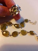 Zilveren ring en armband met geslepen peridoot stenen., Ophalen of Verzenden, Zo goed als nieuw