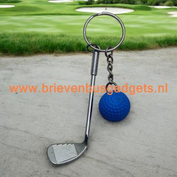 Sleutelhanger Golfclub met bal beschikbaar voor biedingen