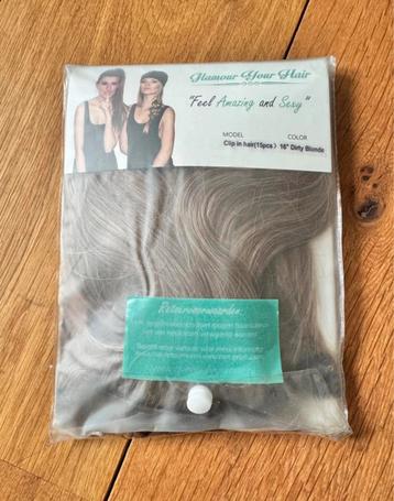 Clip in hair extensions dirty blond beschikbaar voor biedingen