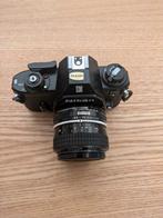 Nikon EM met 28mm 2.8 lichtmeter defect, Ophalen of Verzenden, Zo goed als nieuw, Spiegelreflex, Nikon