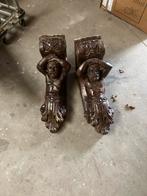 antieke balkdragers van n open haard, Ophalen