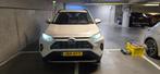 Toyota Rav4 2.5 Hybrid 218pk CVT 2023 Wit, Auto's, 4 cilinders, 2487 cc, Overige bekleding, Wit