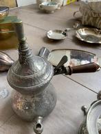 verzilverd theeservies, Ophalen