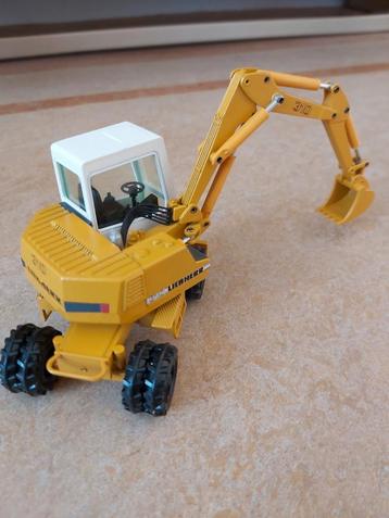 Liebherr A310 hydr.  mobiele graafmachine Conrad 1/50 in OVP beschikbaar voor biedingen