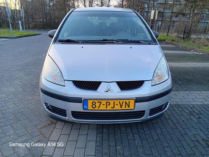 Mitsubishi Colt 1.3 CZ5 2004 Grijs, Auto's, Mitsubishi, Particulier, Colt, ABS, Airbags, Airconditioning, Boordcomputer, Centrale vergrendeling