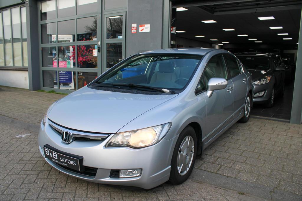 Honda Civic 1.3 Hybrid|STOELVERW+|PARK|CRUISE|CLIMA|DEALER+, Auto's, Gebruikt, 4 cilinders, Met garantie (alle), 116 pk