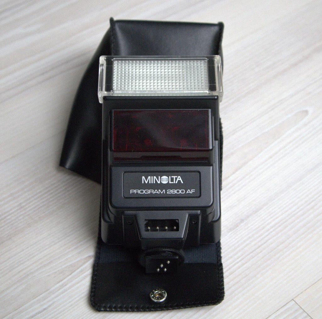 Minolta Program 2800 AF Flitser – Compact & Krachtig + Etui, Ophalen of Verzenden, Gebruikt, Overige merken, Kantelbaar
