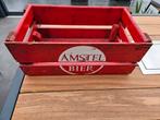 Twee oude houten Amstel kratjes, Ophalen