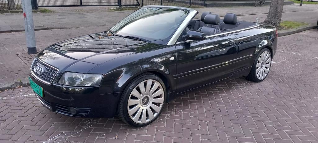 Audi A4 1.8 120KW Cabrio 2004 Zwart Mooie auto!! Rijdt goed!, Auto's, Voorwielaandrijving, Sound system, Zwart, 4 cilinders