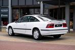 Opel Calibra 2.0i 16V (bj 1996), Auto's, Oldtimers, Lederen bekleding, 1998 cc, 136 pk, Zwart