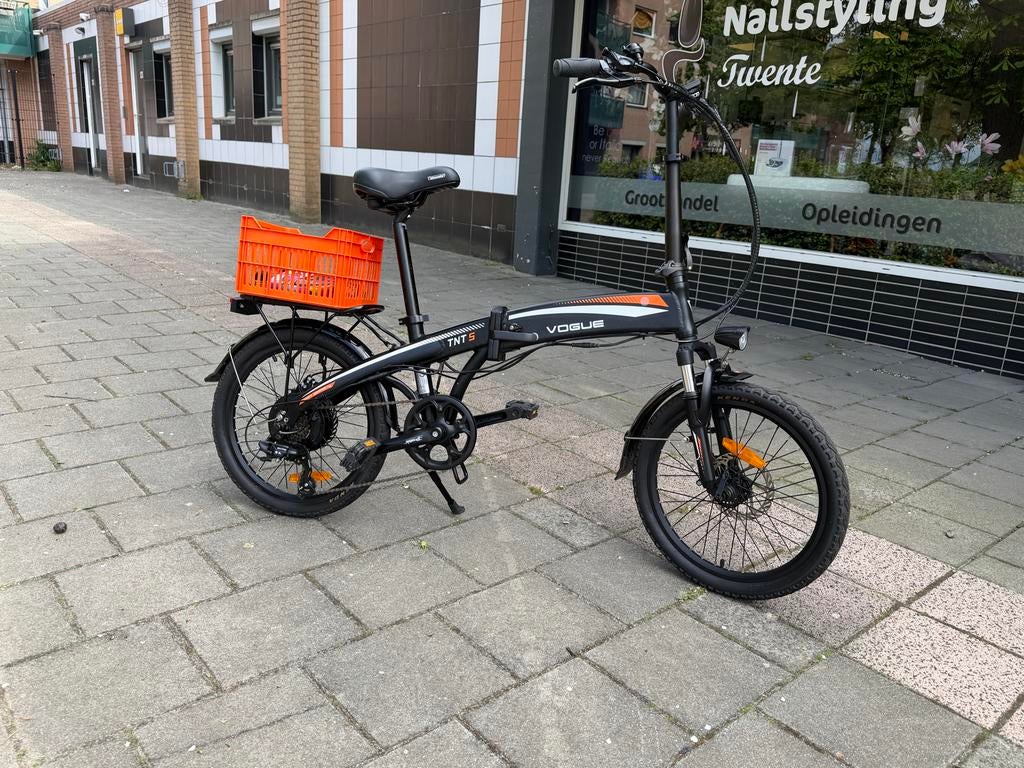 Zwarte electrische Vogue vouwfiets, 20 inch of meer, Zo goed als nieuw, Totaal opvouwbaar, Dames