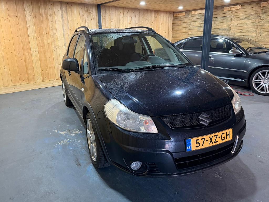 Suzuki SX4 1.6 Shogun 2007 Zwart Airco Trekhaak APK 2027, Auto's, 15 km/l, Gebruikt, 4 cilinders, Origineel Nederlands