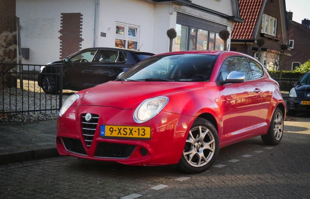 Alfa Romeo MiTo 1.4 16V 2009 Rood, Auto's, Alfa Romeo, Voorwielaandrijving, Stof, 95 pk, 1055 kg