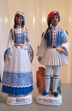 Twee grote Metaxa Ouzo flessen beelden, Ophalen