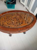 Ovale salontafel met houtsnijwerk, Huis en Inrichting, Tafels | Salontafels, Ophalen of Verzenden, Rechthoekig, 50 tot 100 cm