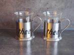 2 theeglazen in rvs houder, Huis en Inrichting, Keuken | Servies, Glas of Glazen, Ophalen of Verzenden, Overige stijlen, Glas