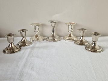 9 verzilverde kandelaars beschikbaar voor biedingen