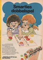 Retro reclame 1975 Smarties chocolade dobbelspelletje, Verzamelen, Verzenden, Overige typen