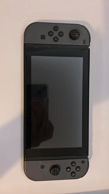 Grijze nintendo switch + bescherm hoes en spellen beschikbaar voor biedingen
