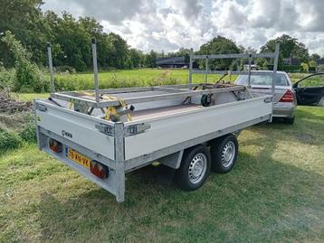Net binnen - Supernette jonggebruikte Henra plateauwagen beschikbaar voor biedingen