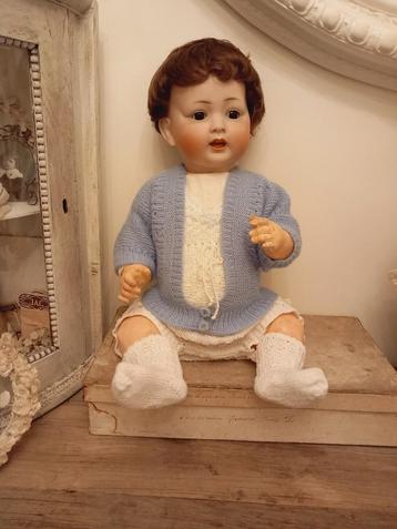 Vintage baby poppen vestje .hand gebreid  wol jaren 50.