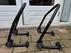 paddock stand voor en achter, Ophalen