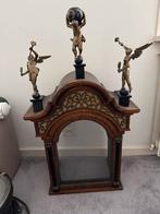 Oude klok met engelen antiek, Ophalen