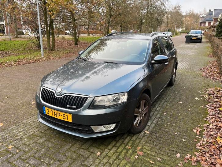 Skoda Octavia 1.6 TDI 81KW Combi 2014 Grijs, Auto's, Skoda, Particulier, Octavia, ABS, Airconditioning, Boordcomputer, Cruise Control