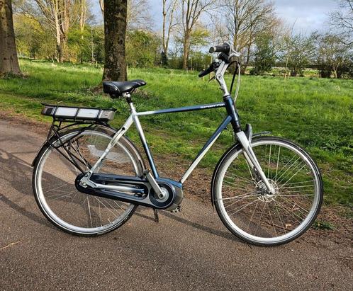 Elektrische Herenfiets Sparta M8I., Fietsen en Brommers, Elektrische fietsen, Gebruikt, Sparta, 55 tot 59 cm, 50 km per accu of meer