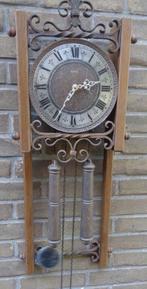 Jaren 70 wandklok met smeedijzer, Ophalen of Verzenden