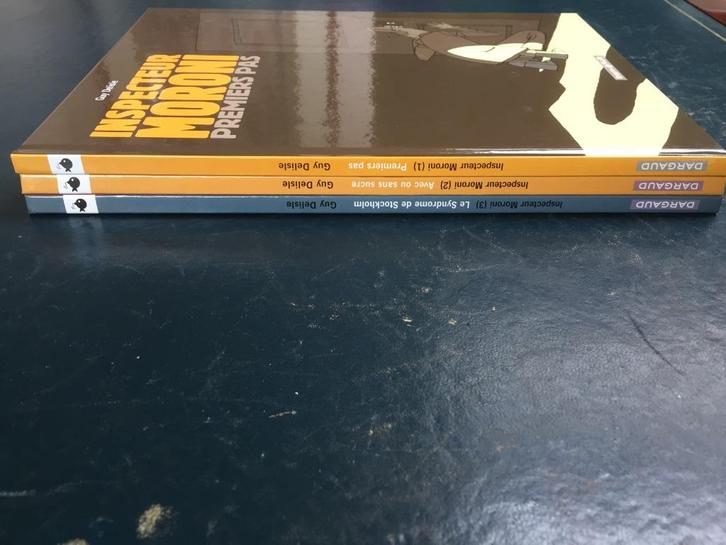 Inspecteur Moroni deel 1 t/m 3 HC door Guy Delisle ZGAN!, Boeken, Stripboeken, Zo goed als nieuw, Meerdere stripboeken, Ophalen of Verzenden