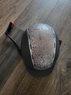 Paardrijcap, Ophalen